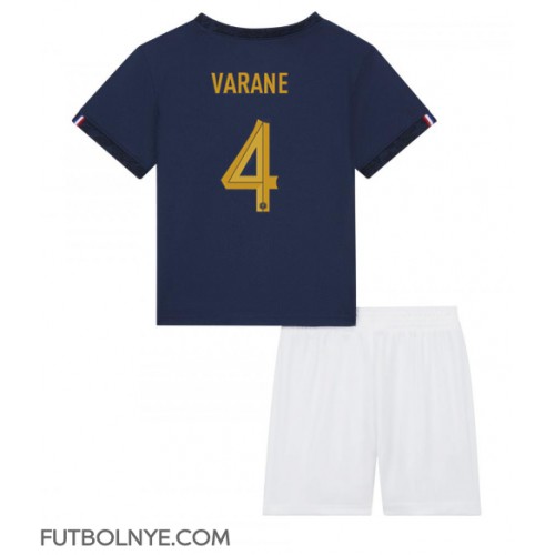 Camiseta Francia Raphael Varane #4 Primera Equipación para niños Mundial 2022 manga corta (+ pantalones cortos)